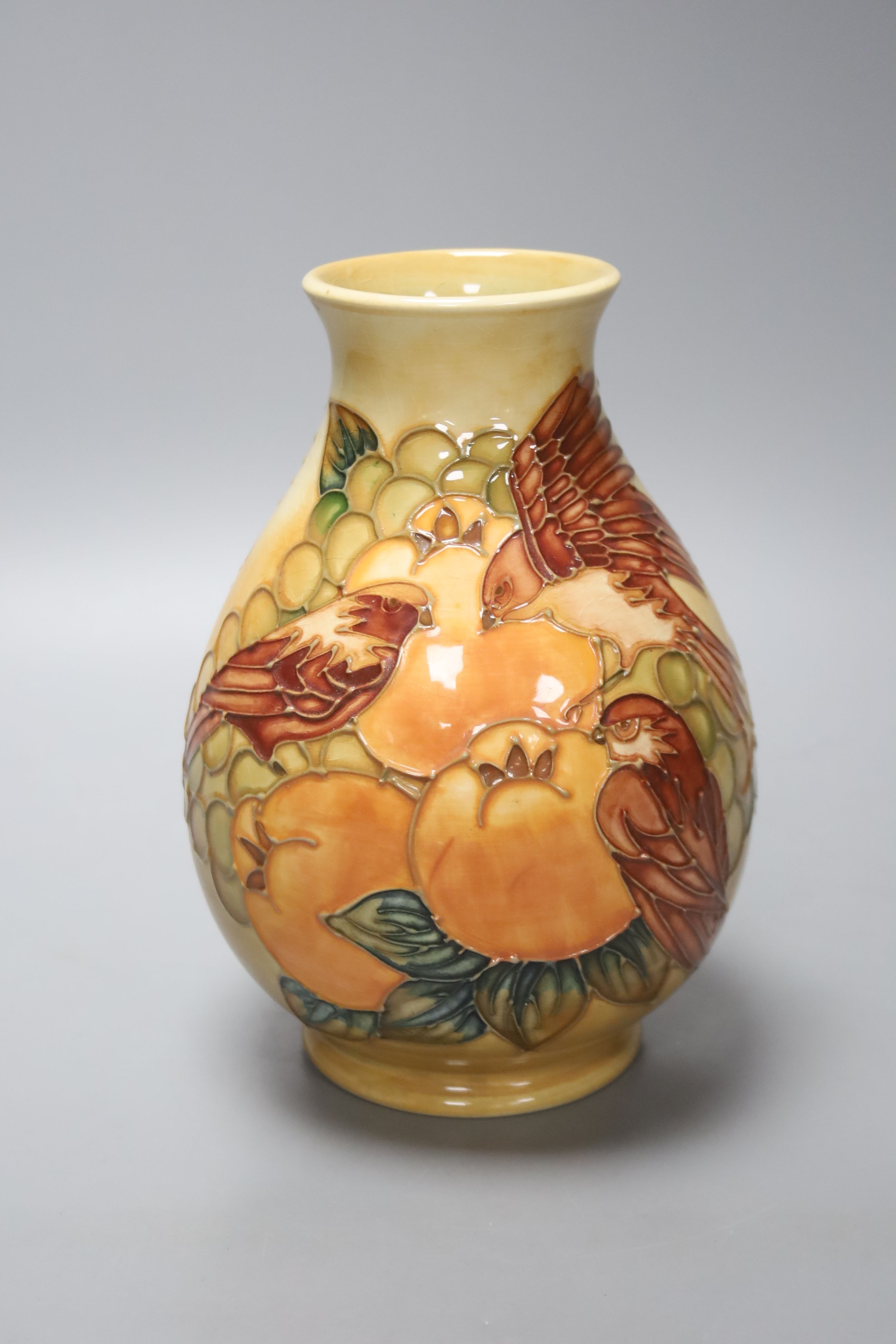 A small Moorcroft vase - Peach and Finch pattern